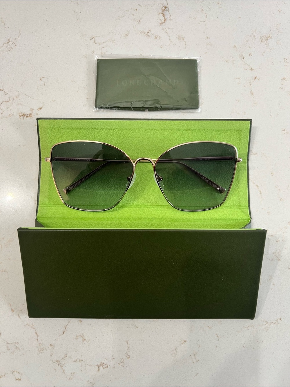 Longchamp Gold Frame Sunglasses with Green Gradient Lenses